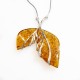 Collier d'ambre miel et argent 925/1000 en forme de feuille