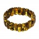 Woman bracelet all amber green color