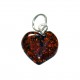 Small heart of amber color cognac