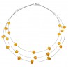 Collier de perles d'ambre couleur miel
