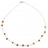 Collier d'ambre perle couleur miel sur cable acier