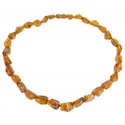 Collier d'ambre véritable couleur cognac, taille irrégulière