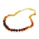 Collier d'ambre bébé couleur arc en ciel multicolore