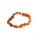 Bracelet ambre bébé perle olive cognac