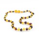 Collier d'ambre bébé, perle ronde couleur miel et cerise