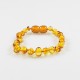 Bracelet ambre bébé couleur cognac