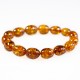 Bracelet d'ambre adulte, perle ovale couleur miel