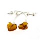 Boucle d'oreille argent avec coeur en ambre cognac